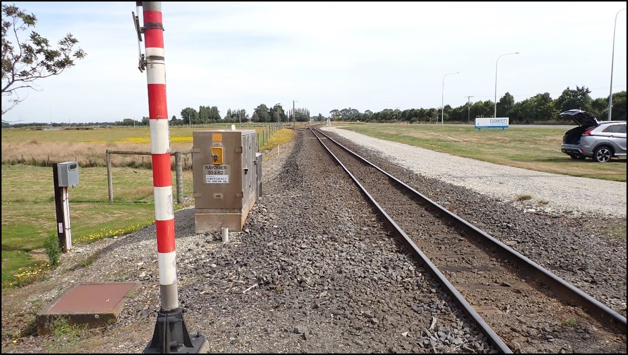 Photo of the signalling cabinet located near track at the crossing