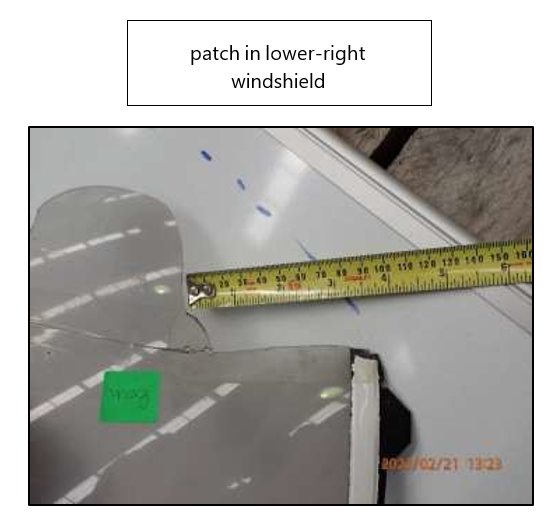 The image showing patch in lower-right windshield