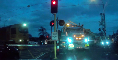 Freight train about to collide with truck on level crossing in Waikanae