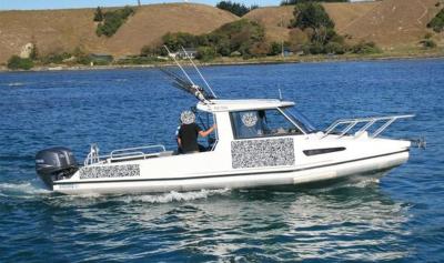 Photograph of accident boat. Identifying marks are obscured in post production.