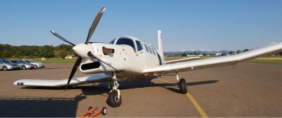 Photo of the landed aircraft with broken right undercarriage