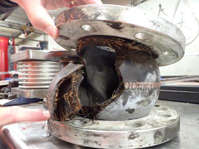 A ruptured rubber expansion joint