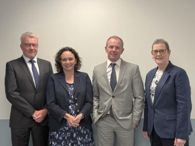 Photo of the four TAIC commissioners