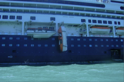 Number 7 lifeboat in vertical position after failure of wire fall. Courtesy of H