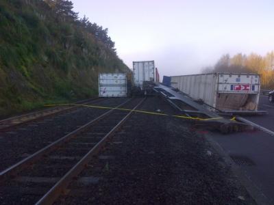 Photograph of wagon and containers fouling State Highway One. Courtesy of KiwiRa