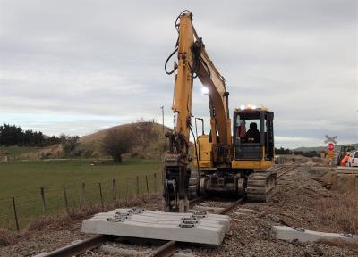 A Hi-Rail digger in a re-enactment on site