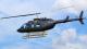 ZK-IGD, Bell 206L-3 LongRanger helicopter, in flight Photographed near Auckland, January 2022. The helicopter has landing skids.