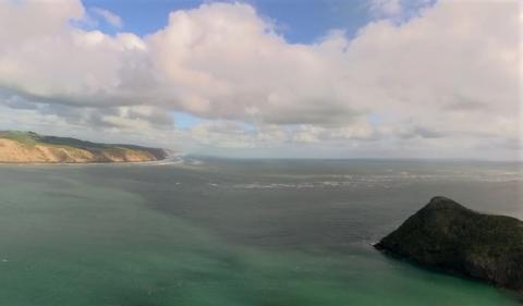 Photo of the Manukau Bar taken from atop the Whatipu Coast Walk 